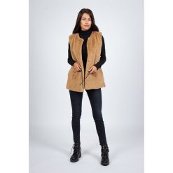 Kamizelka w kolorze karmelowym. Pomarańczowe kamizelki damskie Snowie Collection, m, w paski, ze skóry, długie, bez kaptura. W wyprzedaży za 129,95 zł.