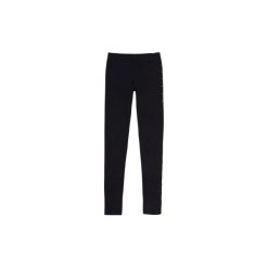 Legginsy damskie. Czarne legginsy damskie marki TXM, bez wzorów. Za 23,99 zł.