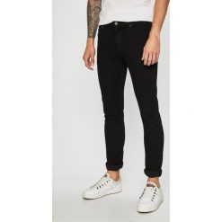 Jack & Jones - Jeansy Glenn. Czarne jeansy męskie Jack & Jones, z aplikacjami, z obniżonym stanem. Za 169,90 zł.