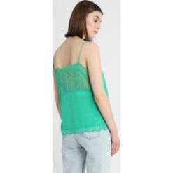 Custommade POULINE Top jolly green. Zielone koszulki damskie marki Custommade, bez wzorów, z jedwabiu, bez kołnierzyka. Za 399,00 zł.