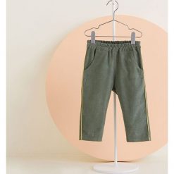 Mango Kids - Spodnie dziecięce Suitfi 80-104 cm. Żółte spodnie dziewczęce Mango Kids, z bawełny, casualowe. W wyprzedaży za 29,90 zł.