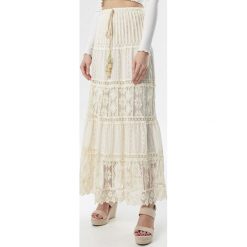 Jasnobeżowa Spódnica Corraemora. Brązowe spódniczki damskie Born2be, s, z haftami, boho, maxi, rozkloszowane. Za 119,99 zł.