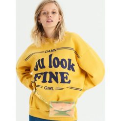 Bluza z napisem - Żółty. Żółte bluzy rozpinane damskie Sinsay, l, z napisami. Za 49,99 zł.