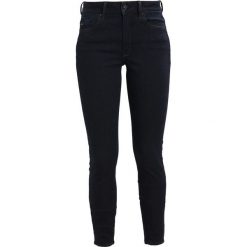 GStar Jeans Skinny Fit rinsed. Czarne jeansy damskie G-Star, z elastanu. W wyprzedaży za 395,85 zł.