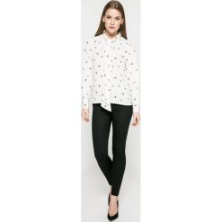 Vero Moda - Bluzka. Czarne bluzki damskie Vero Moda, s, bez wzorów, z poliesteru, casualowe, ze stójką, z długim rękawem. W wyprzedaży za 59,90 zł.