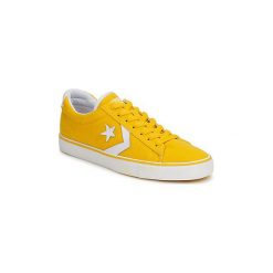 Buty Converse PRO LEATHER CANVAS OX. Żółte trampki męskie marki Converse, bez wzorów, bez zapięcia. Za 199,00 zł.