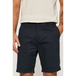 Scotch & Soda - Szorty. Niebieskie spodenki i szorty męskie Scotch & Soda, bez wzorów, z elastanu, casualowe. Za 389,90 zł.