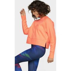 Bluza damska. Bluzy damskie l, bez wzorów, z dzianiny, z krótkim rękawem, krótkie, bez kaptura. Za 99,99 zł.