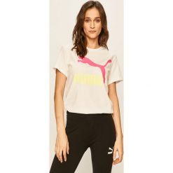 Puma - T-shirt. Białe bluzki damskie Puma, s, z nadrukiem, z elastanu, casualowe, z okrągłym kołnierzem, z krótkim rękawem. W wyprzedaży za 99,90 zł.