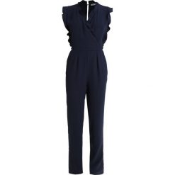 Modström JULES Kombinezon navy sky. Niebieskie kombinezony damskie marki Modström, xl, z poliesteru. Za 459,00 zł.