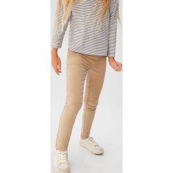 Mango Kids - Spodnie dziecięce Snowy 116-164 cm. Spodnie dziewczęce Mango Kids, bez wzorów, z elastanu, casualowe. Za 69,90 zł.