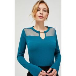 Bluzka z łączonych materiałów. Niebieskie bluzki damskie Moodo, xl, w koronkowe wzory, z elastanu, z okrągłym kołnierzem, z długim rękawem. Za 9,99 zł.
