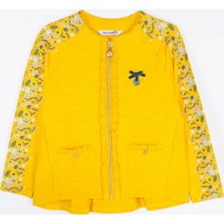 Coccodrillo - Bluza dziecięca 98-122 cm. Żółte bluzy dziewczęce COCCODRILLO, z nadrukiem, z dzianiny, bez rękawów, bez kaptura. Za 79,90 zł.