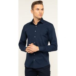 Koszula Calvin Klein 2ply Poplin K10K103164. Niebieskie koszule męskie Calvin Klein, m, bez wzorów, z elastanu, biznesowe, bez kołnierzyka, bez rękawów. W wyprzedaży za 199,00 zł.