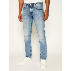 Jeansy Regular Fit TOMMY HILFIGER MW0MW10874. Niebieskie jeansy męskie TOMMY HILFIGER, m, bez wzorów, z elastanu. W wyprzedaży za 279,00 zł.