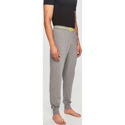 Calvin Klein Underwear - Spodnie piżamowe. Szare piżamy męskie Calvin Klein Underwear, xl, bez wzorów, z elastanu, bez rękawów. W wyprzedaży za 179,90 zł.
