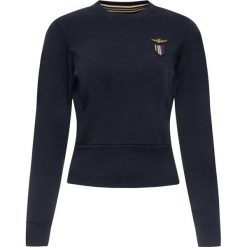 Bluza Aeronautica Militare 192FE1452DF336. Czerwone bluzy damskie Aeronautica Militare, s, bez wzorów, z elastanu, bez rękawów, bez kaptura. W wyprzedaży za 299,00 zł.