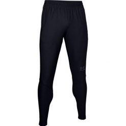 Under Armour Accelerate Pro Pant 1328061-001 spodnie męskie czarne XXL. Czarne spodnie męskie Under Armour, na co dzień, xxl, bez wzorów, z poliesteru. W wyprzedaży za 299,99 zł.