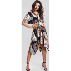 Musztardowa Sukienka Makes. Czarne sukienki damskie other, xl, bez wzorów, z asymetrycznym kołnierzem, z krótkim rękawem, krótkie, midi, asymetryczne. Za 64,99 zł.