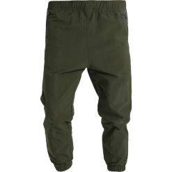 Spodnie dresowe męskie: adidas Originals TRACK Spodnie treningowe night cargo