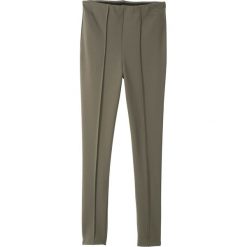 Legginsy z przeszytym kantem bonprix ciemnooliwkowy. Zielone spodnie dziewczęce bonprix, bez wzorów. Za 24,99 zł.