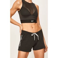 Reebok - Szorty. Czarne spodenki sportowe damskie Reebok, s, z nadrukiem, z bawełny, sportowe. Za 69,90 zł.