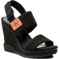 Espadryle CALVIN KLEIN JEANS - Lacey Canvas R8811 Black. Czarne espadryle damskie marki Calvin Klein Jeans, w paski, z jeansu, bez obcasa, na koturnie. Za 519,90 zł.