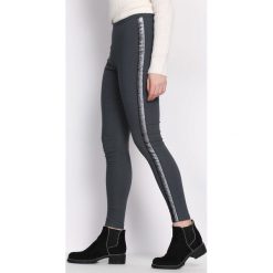 Szare Legginsy Rousing. Czarne legginsy marki Born2be, l. Za 59,99 zł.