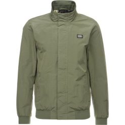 Scotch & Soda SIMPLE HARRINGTON Kurtka wiosenna military green. Szare kurtki męskie marki Scotch & Soda, l, z nadrukiem, z bawełny, z kapturem. Za 599,00 zł.