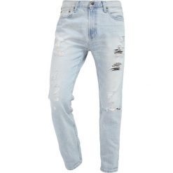 Hollister Co. Jeansy Slim Fit destroyed. Szare rurki męskie Hollister Co. W wyprzedaży za 186,75 zł.