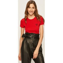Guess Jeans - T-shirt. Białe bluzki damskie Guess Jeans, s, z aplikacjami, z bawełny, z okrągłym kołnierzem. W wyprzedaży za 99,90 zł.