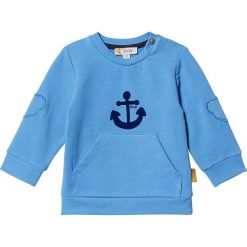 Bluza w kolorze błękitnym. Niebieskie bluzy niemowlęce Steiff, z aplikacjami, bez rękawów, bez kaptura. W wyprzedaży za 85,95 zł.