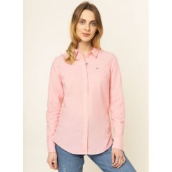 Koszula Tommy Jeans Oxford DW0DW07808. Białe bluzki damskie Tommy Jeans, m, bez wzorów, z bawełny, bez kołnierzyka, bez rękawów. Za 299,00 zł.