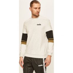 Diadora - Bluza. Białe bluzy męskie Diadora, s, z aplikacjami, z bawełny, z okrągłym kołnierzem, bez rękawów, bez kaptura. W wyprzedaży za 119,90 zł.