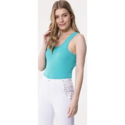 Miętowa Koszulka Thatch. Zielone koszulki damskie Born2be, xl, z aplikacjami, z dzianiny, z okrągłym kołnierzem, bez rękawów. Za 19,99 zł.