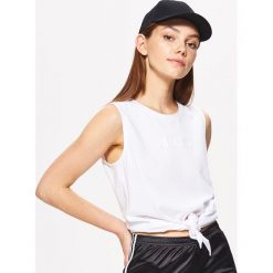 Top z wiązaniem - Biały. Białe topy damskie Cropp, s, bez wzorów, bez kołnierzyka. Za 49,99 zł.