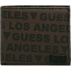 Guess Jeans - Portfel. Pomarańczowe portfele męskie Guess Jeans, z aplikacjami, z poliesteru. Za 319,90 zł.