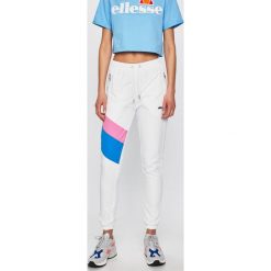 Ellesse - Spodnie. Białe spodnie damskie Ellesse, s, bez wzorów, z poliesteru. Za 219,90 zł.