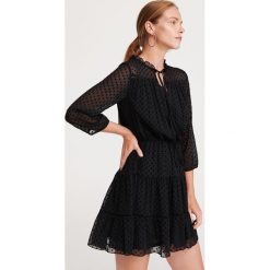 Sukienka z tkaniny plumeti - Czarny. Czarne sukienki damskie Reserved, s, bez wzorów, z tkaniny, bez kołnierzyka, bez rękawów. Za 159,99 zł.