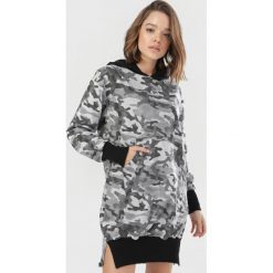 Czarna Tunika Zarinnessa. Czarne tuniki damskie Born2be, xl, bez wzorów, bez kołnierzyka, bez rękawów. Za 79,99 zł.