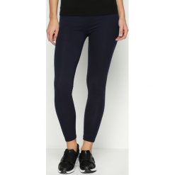 Spodnie damskie: Granatowe Legginsy Feather