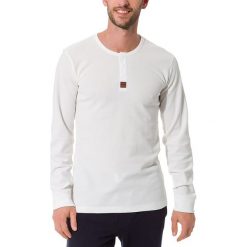 Koszulka w kolorze białym. Białe koszulki męskie Skiny Women & Men, m, z aplikacjami, z bawełny, z okrągłym kołnierzem, bez rękawów. W wyprzedaży za 42,95 zł.