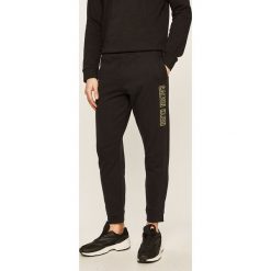Calvin Klein Performance - Spodnie. Czarne spodnie męskie Calvin Klein Performance, xl, bez wzorów, z bawełny. Za 329,90 zł.