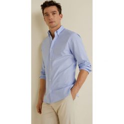 Mango Man - Koszula Arnold4. Czerwone koszule męskie marki Mango Man, s, bez wzorów, z bawełny, casualowe, button down, z długim rękawem. Za 139,90 zł.