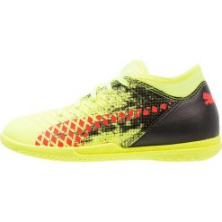 Puma FUTURE 18.4 IT Halówki fizzy yellow/red blast/black. Żółte buty sportowe męskie Puma, z tworzywa sztucznego, do piłki nożnej. Za 189,00 zł.