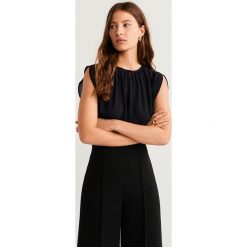 Mango - Bluzka Ferrara. Różowe bluzki damskie Mango, s, bez wzorów, z poliesteru, bez kołnierzyka, bez rękawów. Za 119,90 zł.