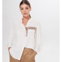 Wiskozowa koszula typu kimono - Kremowy. Białe koszule damskie Mohito, bez wzorów, z wiskozy, bez kołnierzyka, bez rękawów. Za 99,99 zł.