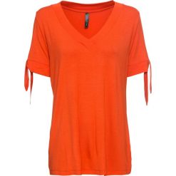 Shirt z przewiązaniem bonprix pomarańczowy. Pomarańczowe koszulki damskie bonprix, bez wzorów, bez kołnierzyka. Za 44,99 zł.