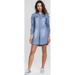 Niebieska Sukienka Symmetrize. Niebieskie sukienki damskie other, xl, bez wzorów, z koszulowym kołnierzykiem, bez rękawów, mini, koszulowe. Za 64,99 zł.