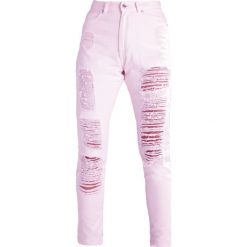 Dr.Denim NORA Jeansy Slim Fit pink. Różowe rurki damskie marki Dr.Denim, z bawełny. W wyprzedaży za 149,50 zł.